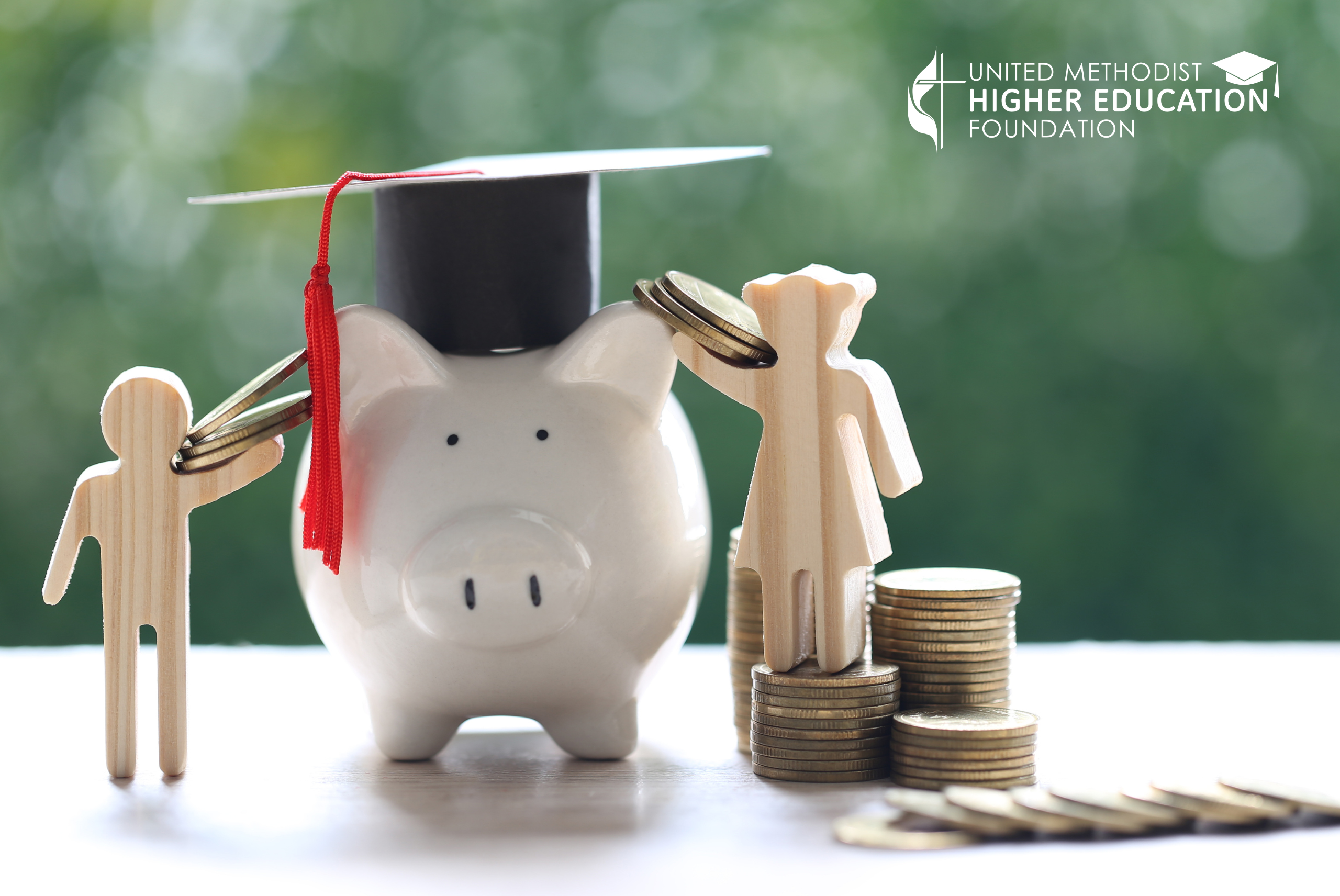 piggy bank wearing graduation cap